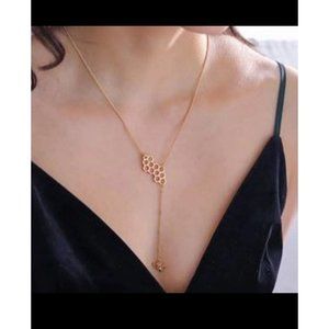 Honeycomb and bee necklace